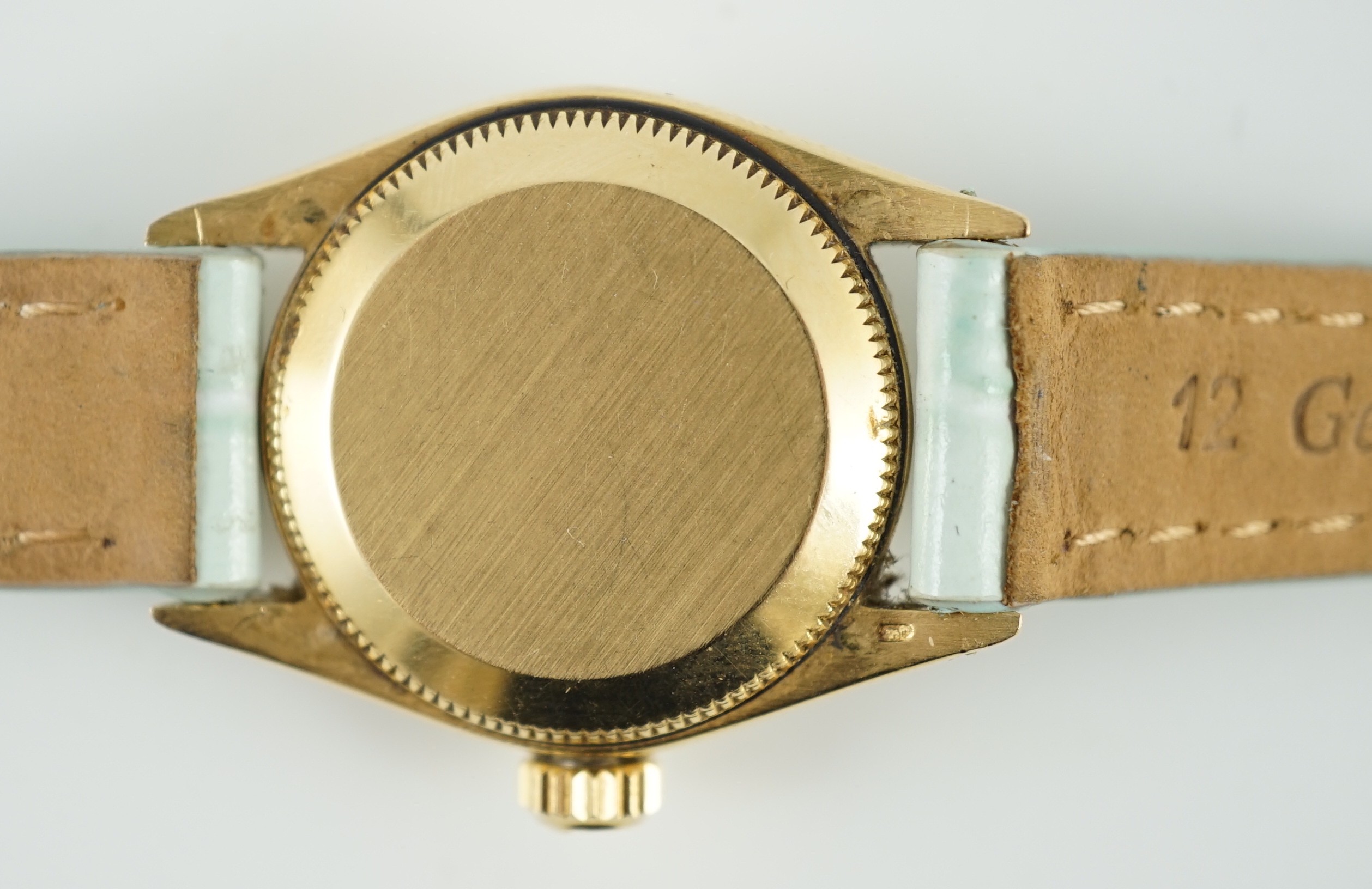 A lady's 18ct gold Rolex Oyster Perpetual wrist watch, on associated leather strap